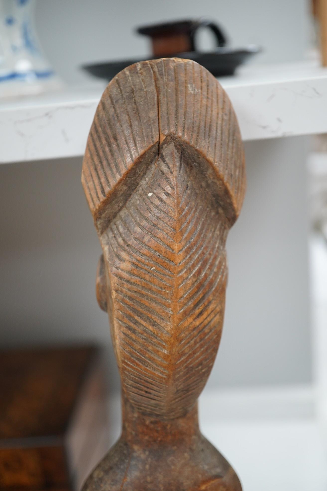 A group of African, Indonesian and other South East Asian carvings and a lacquer box. Sword 60cm long. Condition - poor, fair to good